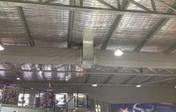 Commercial evaporative air conditioning with duct sock